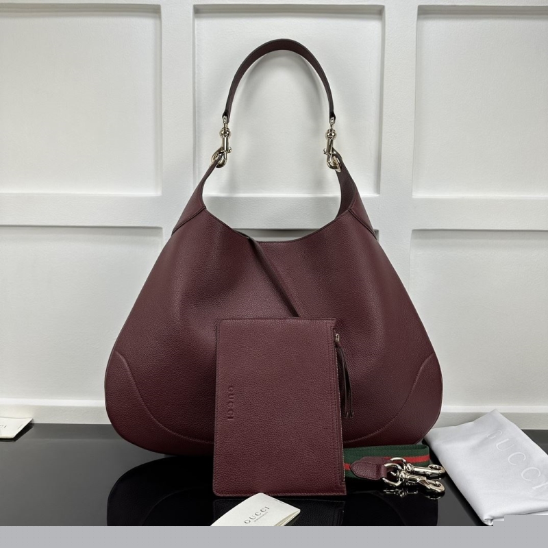 G*u*i top handle bags
